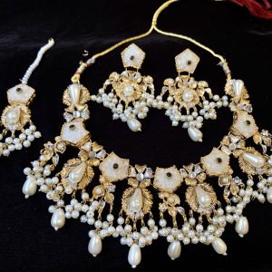 Luminous Elegance: A Sugar Stone Necklace Set in Ivory