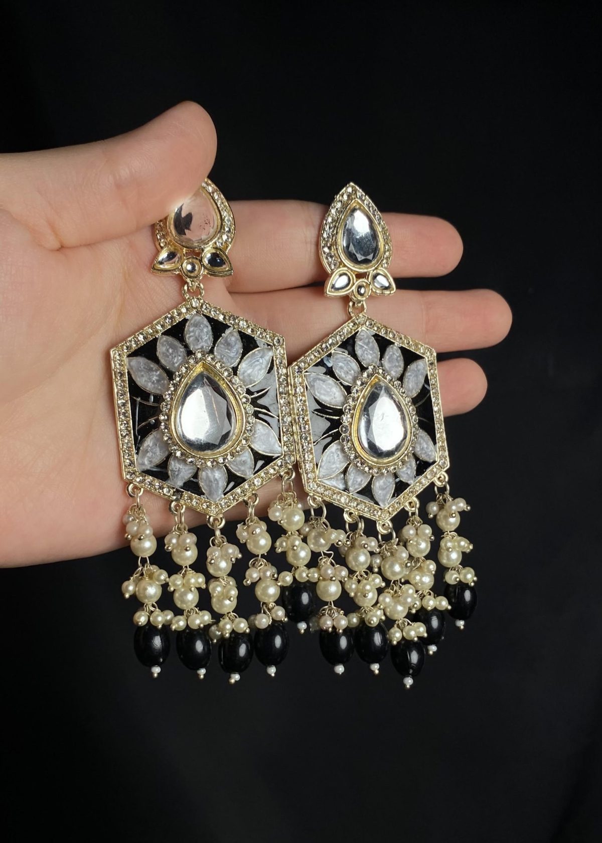long dangling Meenakari and polki earrings, hand-painted to perfection.