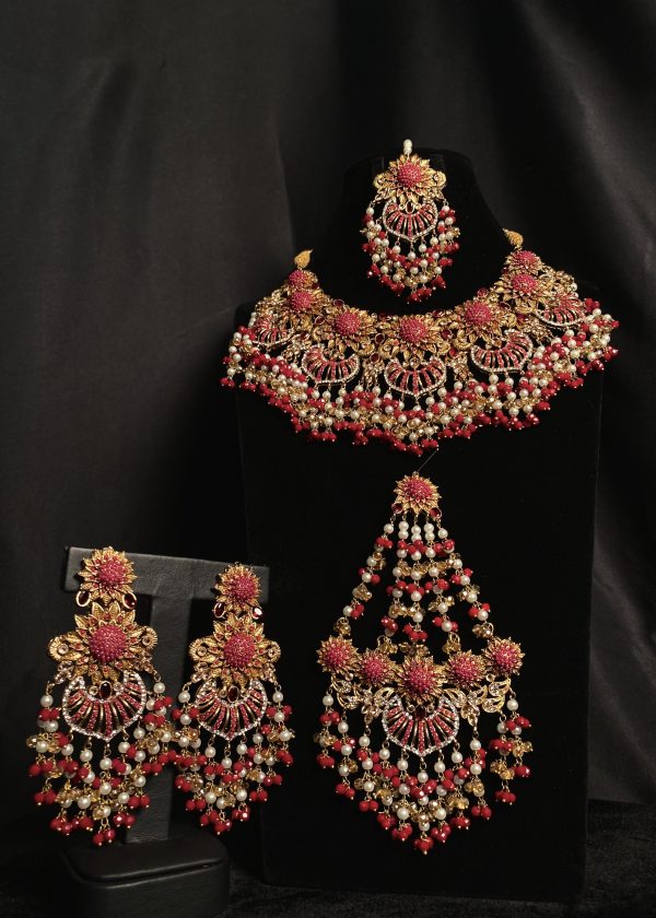 Sahiba Bridal Set in deep pink and maroon hues.