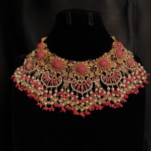 Sahiba Bridal Set in deep pink and maroon hues.