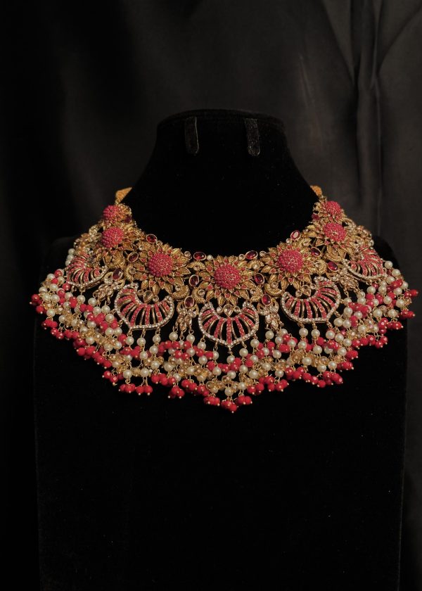 Sahiba Bridal Set in deep pink and maroon hues.