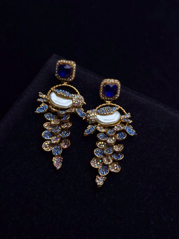 Fleur Orchard cascade earrings with crystals and a baroque pearl in blue