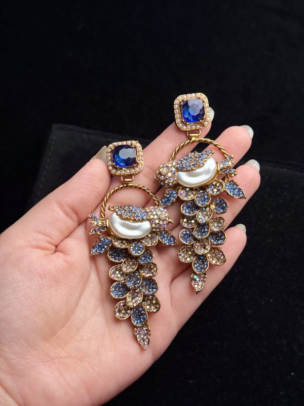 Fleur Orchard cascade earrings with crystals and a baroque pearl in blue