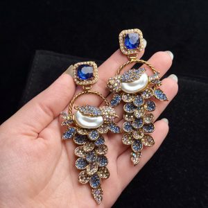 Fleur Orchard cascade earrings with crystals and a baroque pearl in blue