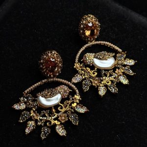 Ornate filigree birdcage drop earrings with a pearl and crystals in champagne