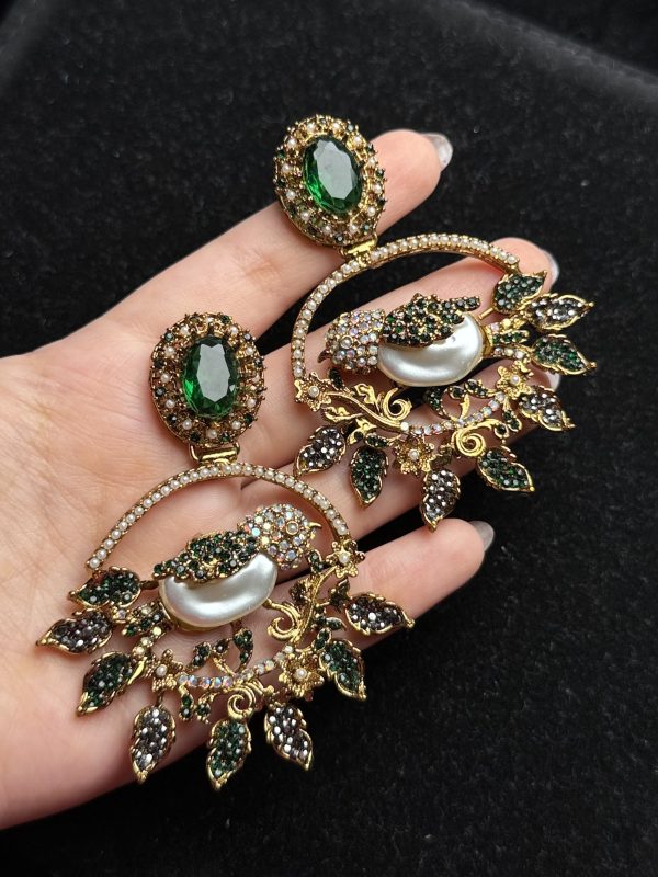 Ornate filigree birdcage drop earrings with a pearl and crystals in Green