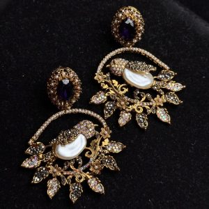 Ornate filigree birdcage drop earrings with a pearl and crystals in Purple