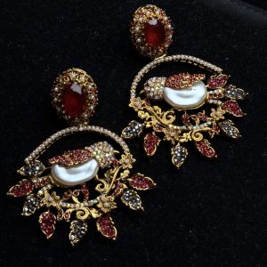 Ornate filigree birdcage drop earrings with a pearl and crystals in red