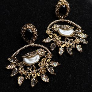 Ornate filigree birdcage drop earrings with a pearl and crystals in black