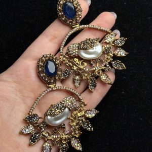 Ornate filigree birdcage drop earrings with a pearl and crystals in midnight blue with black