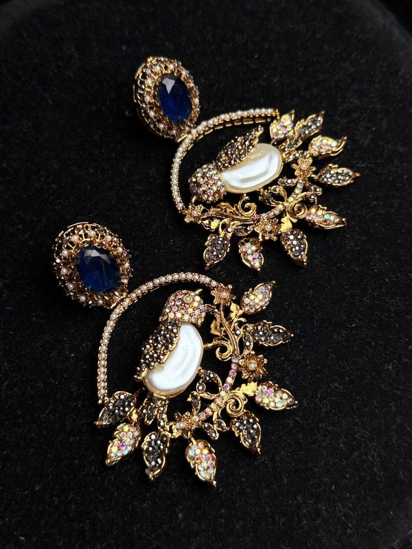 Ornate filigree birdcage drop earrings with a pearl and crystals in midnight blue with black