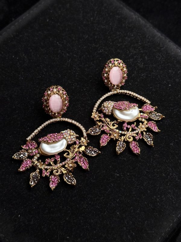 Ornate filigree birdcage drop earrings with a pearl and crystals in pink