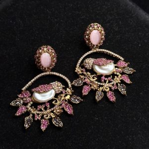 Ornate filigree birdcage drop earrings with a pearl and crystals in pink