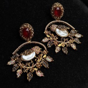Ornate filigree birdcage drop earrings with a pearl and crystals in red