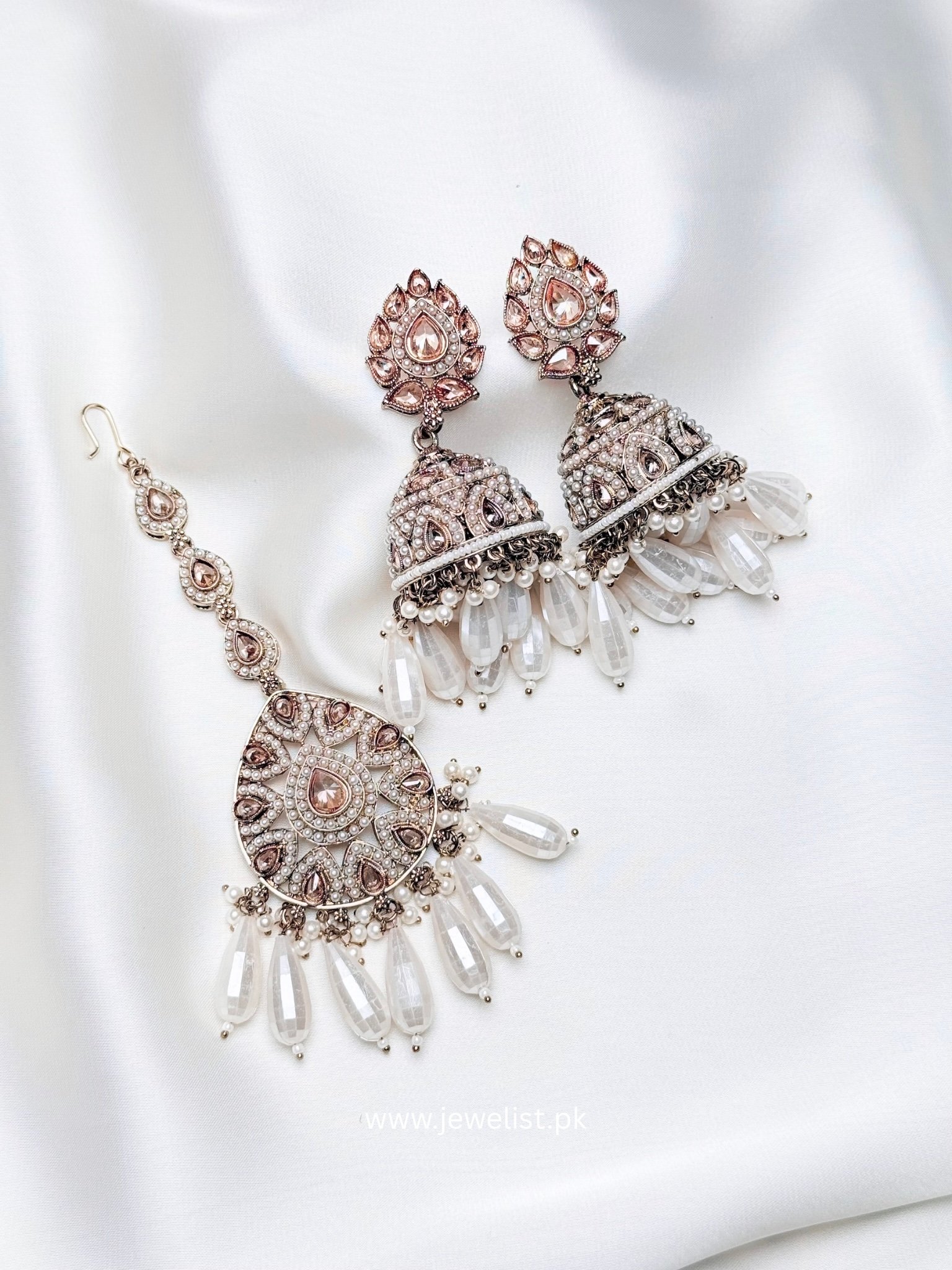 Enchanting Safeena Teeka Jhumka Set - Reverse AD Jhumka Earrings with Maang Teeka in white by Jewelist.pk
