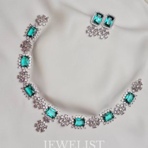 Luxe Link Set by Jewelist.pk with green stone color