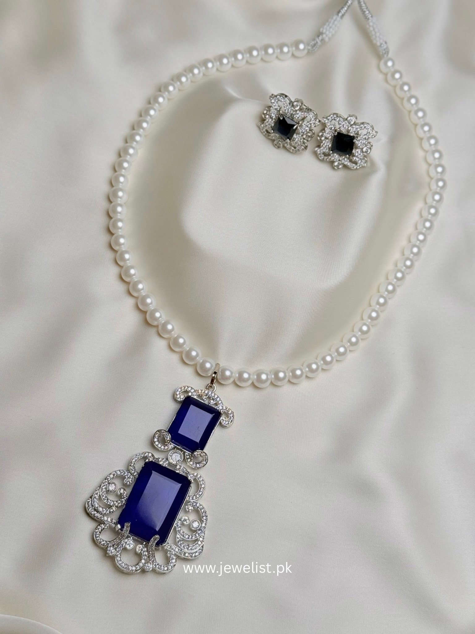 Doublet Pearl Mala Set deep blue version with pearl-like necklace and matching studs