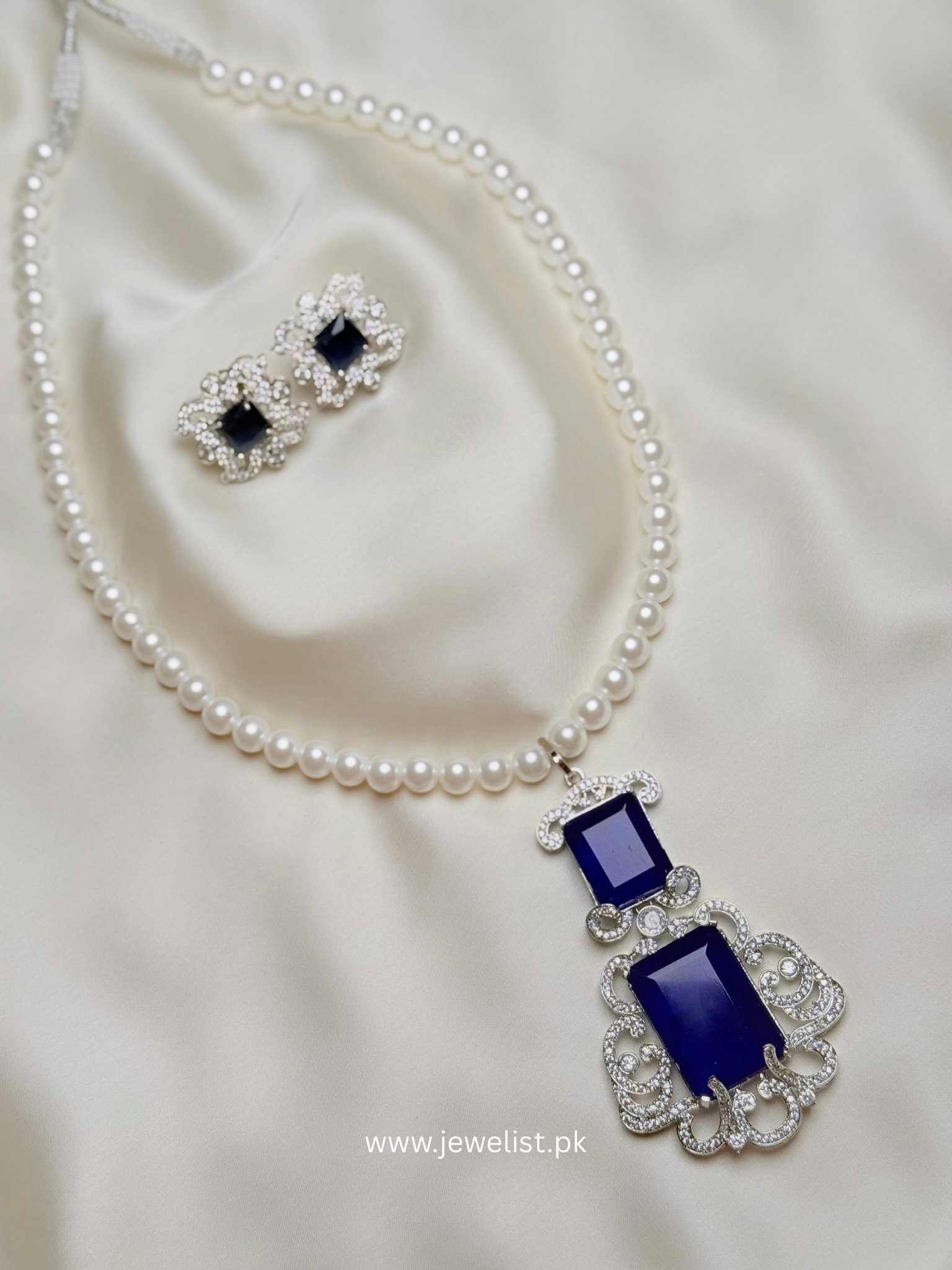 Doublet Pearl Mala Set by Jewelist in deep blue with ornate silver-tone pendant