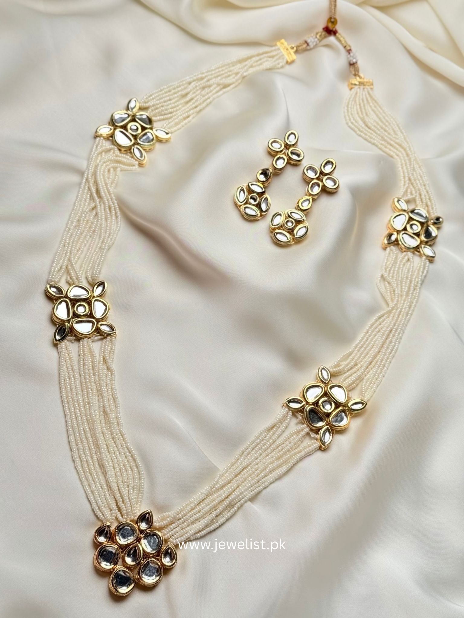 Aarya Kundan Set full ivory pearl kundan necklace and drop earrings by Jewelist