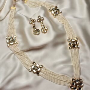 Aarya Kundan Set multi-strand pearl necklace with floral kundan motifs and matching earrings