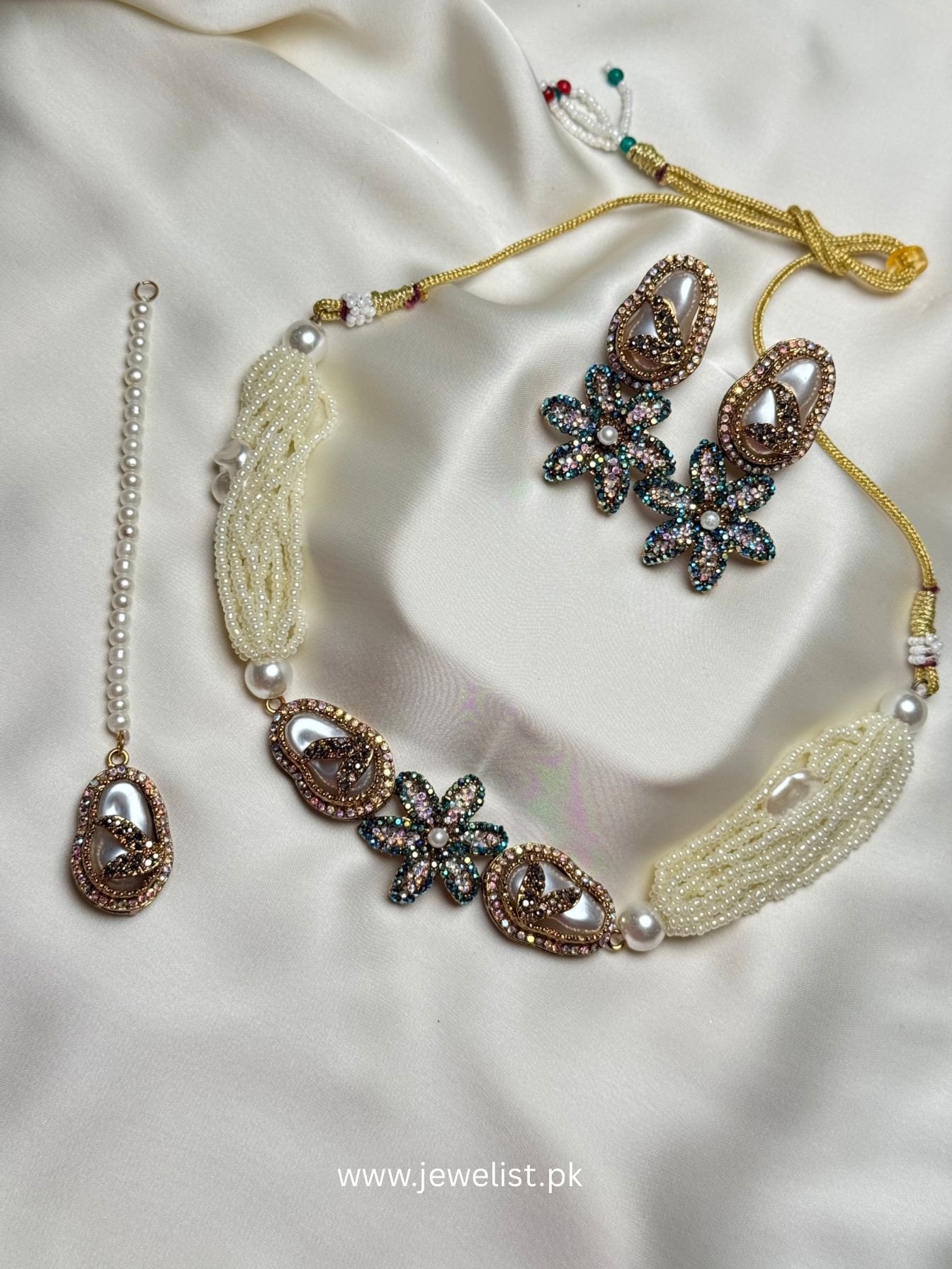 Pearl Floral Statement Necklace Set in aqua with matching floral earrings and tikka