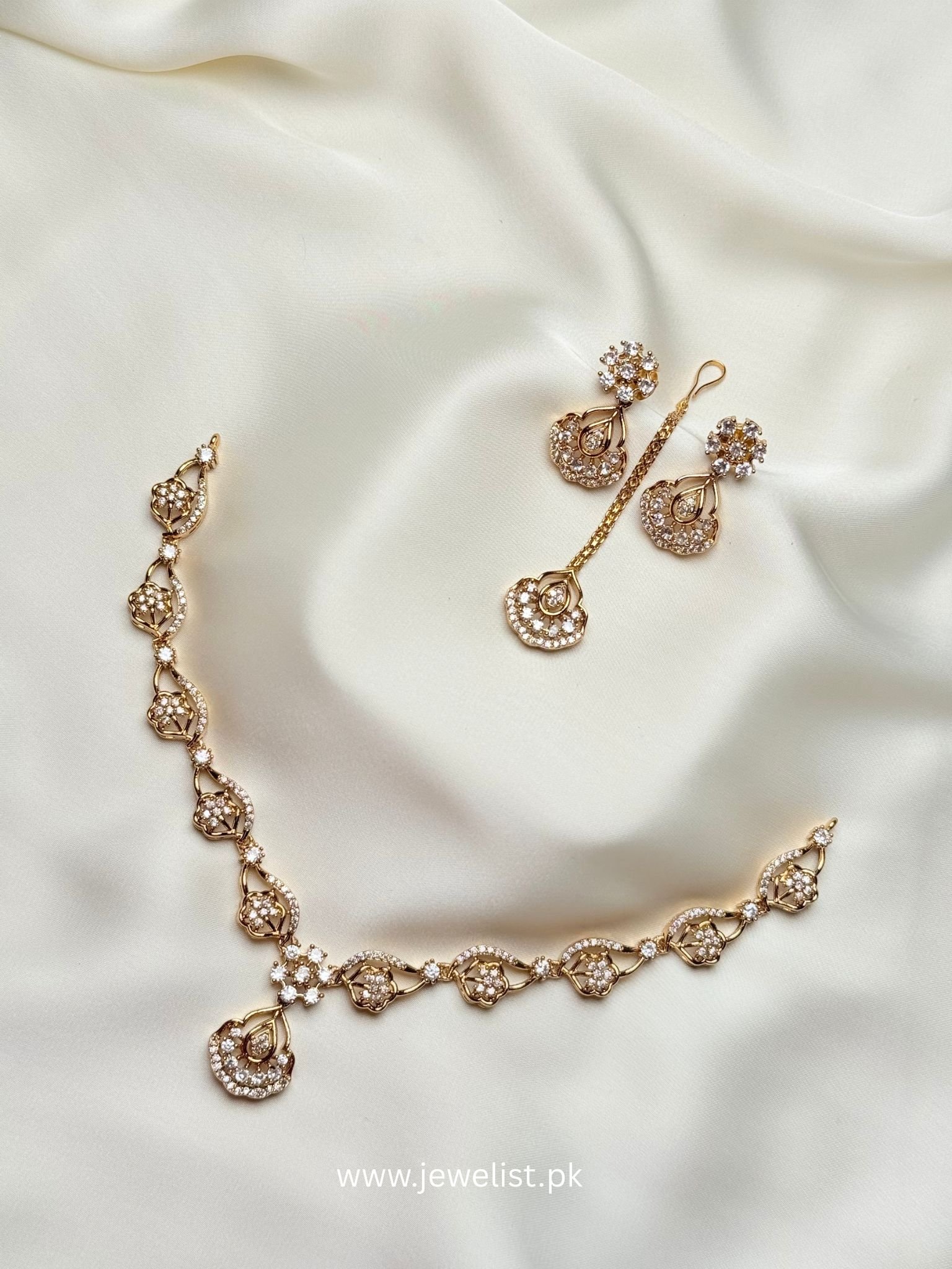 Floral Teardrop Necklace Set in gold tone with crystal-inspired floral motifs