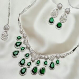 The Esme Set green cascading necklace with teardrop accents and matching earrings