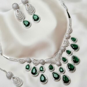 The Esme Set emerald green teardrop necklace and matching earrings by Jewelist