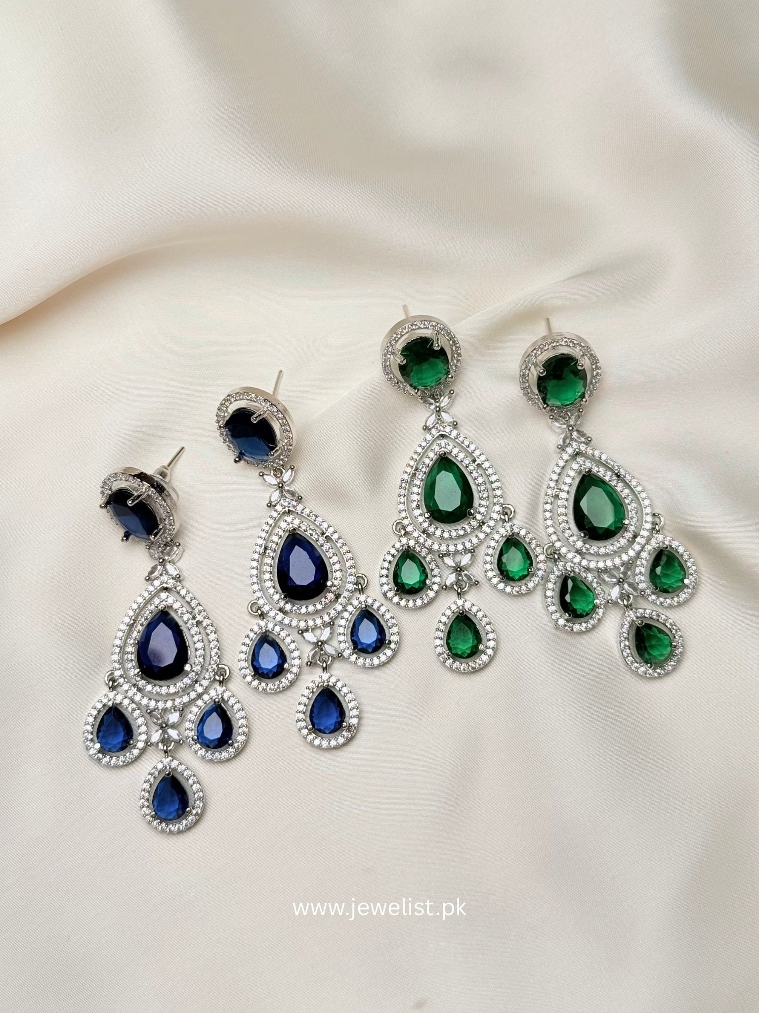 Teardrop Halo Chandelier Earrings by Jewelist shown in blue and green color options