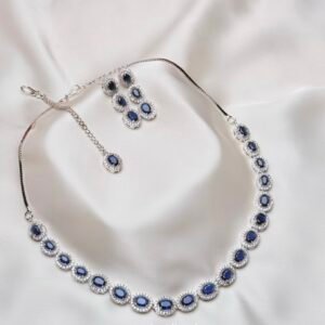 Elise Oval Solitaire Set in blue with repeating oval halo accents and matching jewelry
