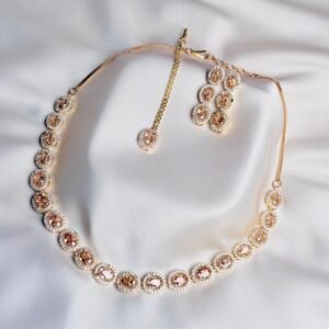Elise Oval Solitaire Set in champagne with oval crystal-inspired necklace and matching pieces
