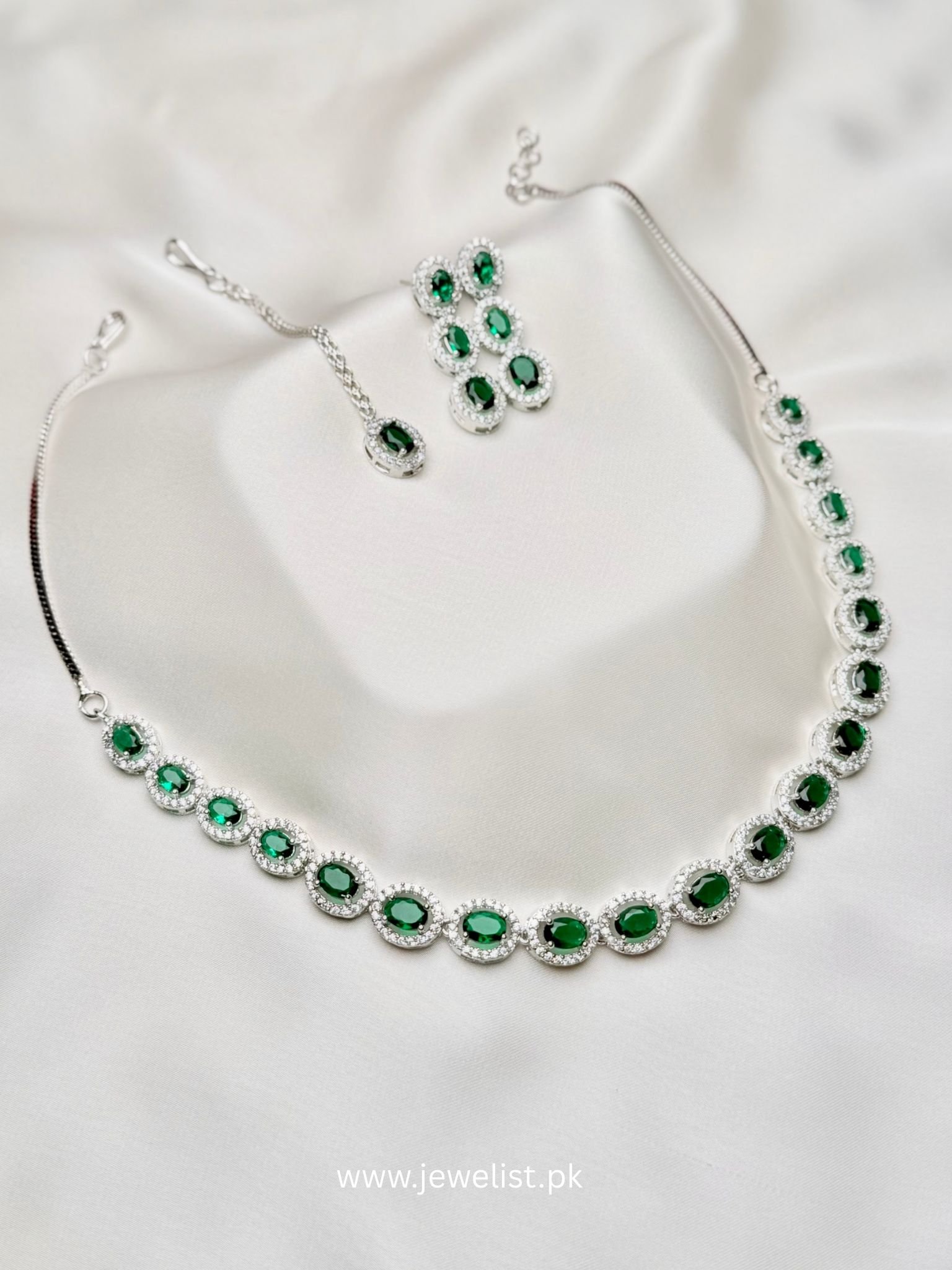 Elise Oval Solitaire Set in emerald green with oval halo necklace, earrings and forehead ornament