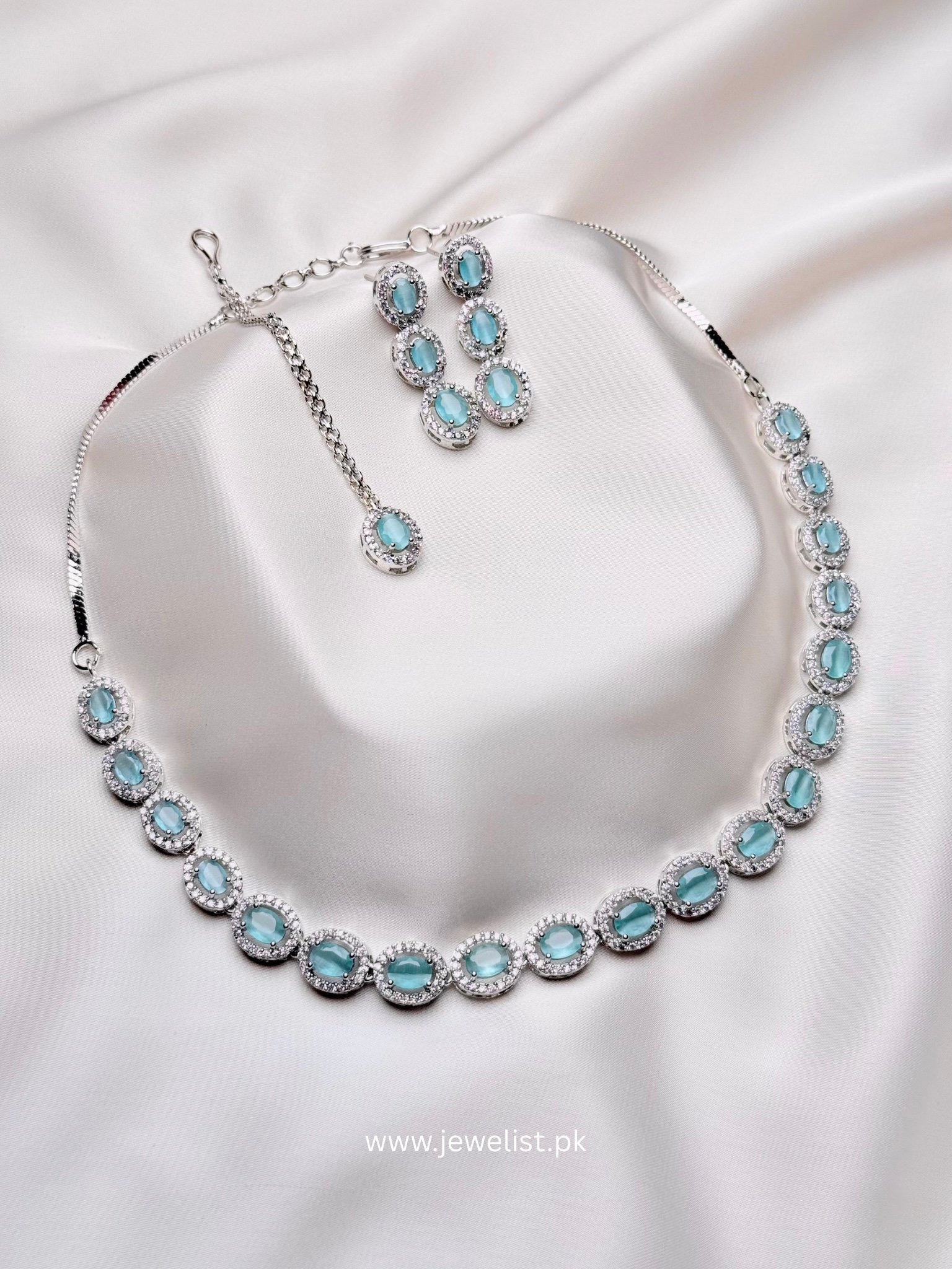 Elise Oval Solitaire Set in mint with silver-tone oval halo necklace and matching earrings