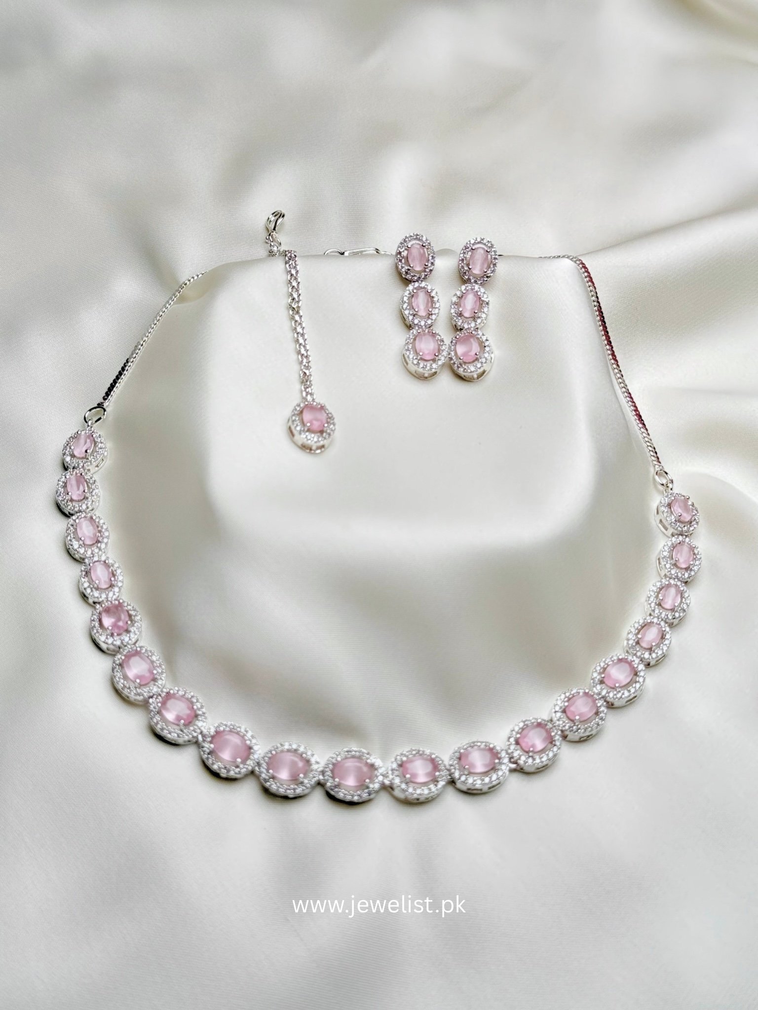 Elise Oval Solitaire Set in pink with oval halo necklace, earrings and forehead ornament