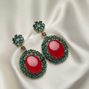 Cabochon Halo Earrings with red oval centers and green stones