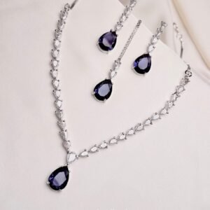 Nouveau Set purple teardrop necklace earrings and teeka in silver-tone finish
