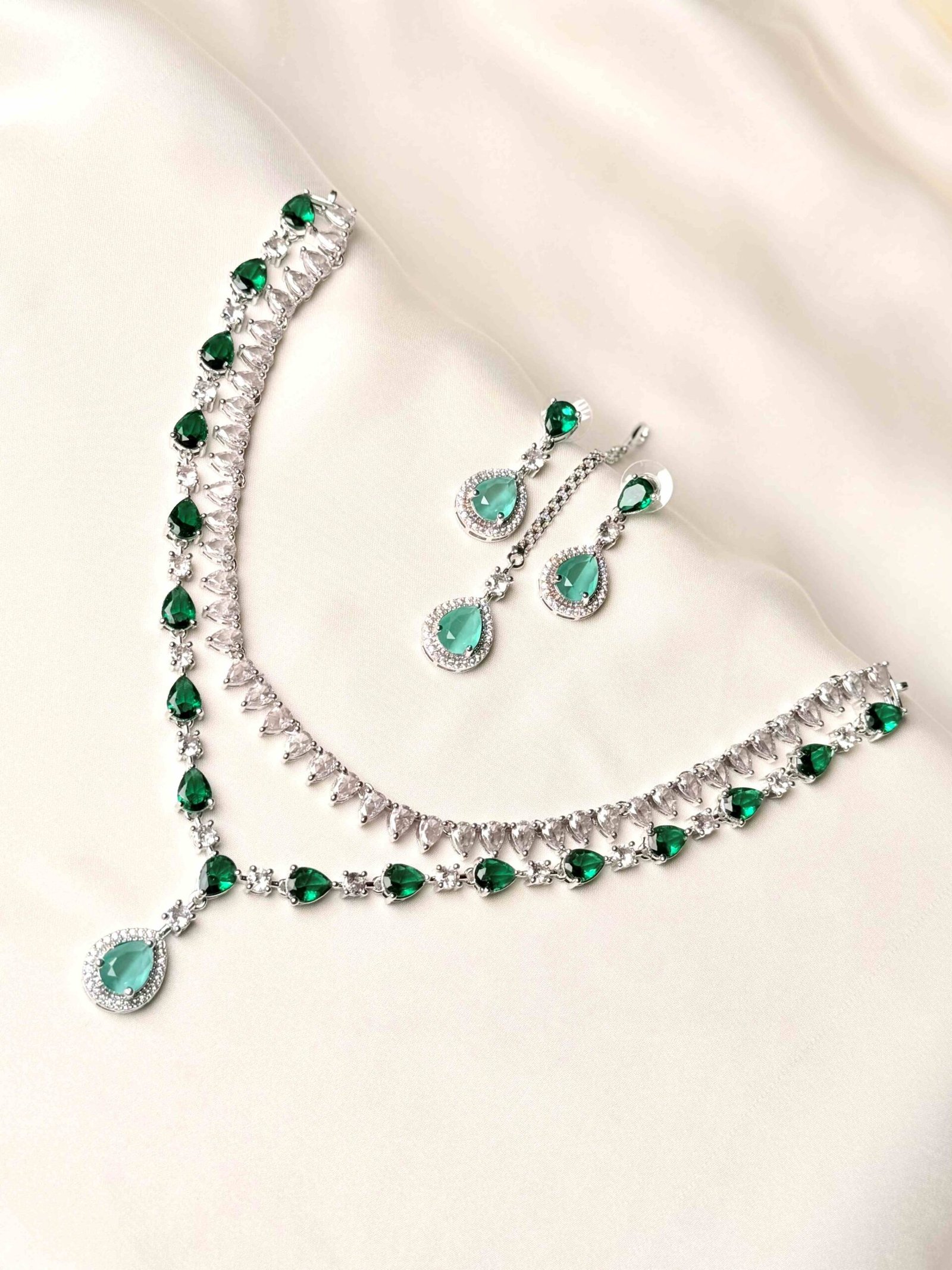 The Iris Cascading Set mint green teardrop necklace earrings and teeka