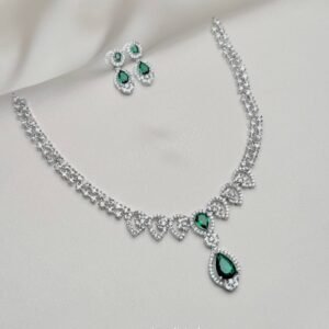 Shimmer Necklace set in silver tone with emerald green teardrop accents and matching earrings