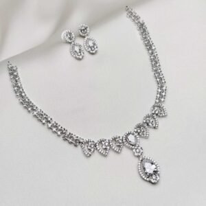 Shimmer Necklace set in silver tone with clear teardrop centerpiece and matching sparkling earrings