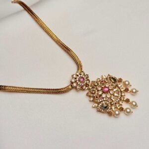 Gold Tone Pearl Drop Pendant Necklace front view with pink green accents and pearl-like drops